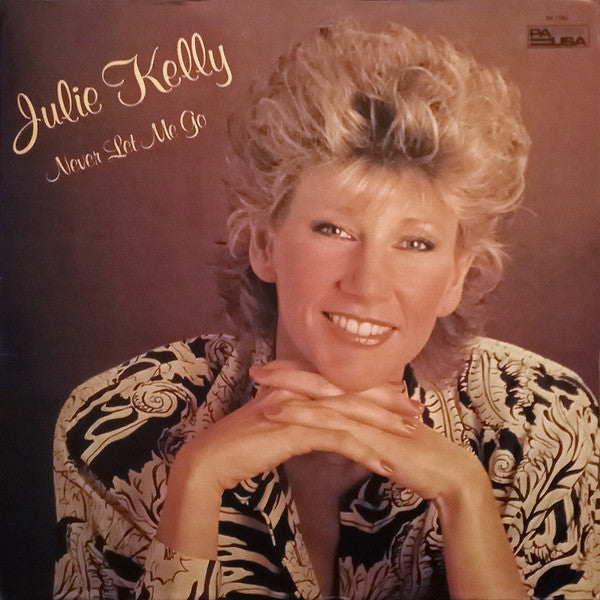 Front cover of Julie Kelly – Never Let Me Go, Pausa Records, US, 1985